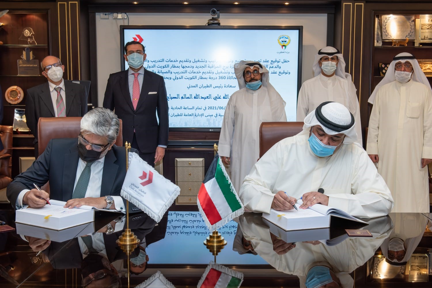 DGCA President signed a contract with Spanish company , Indra, to provide communication equipment for the new tower at Kuwait International Airport KUWAIT